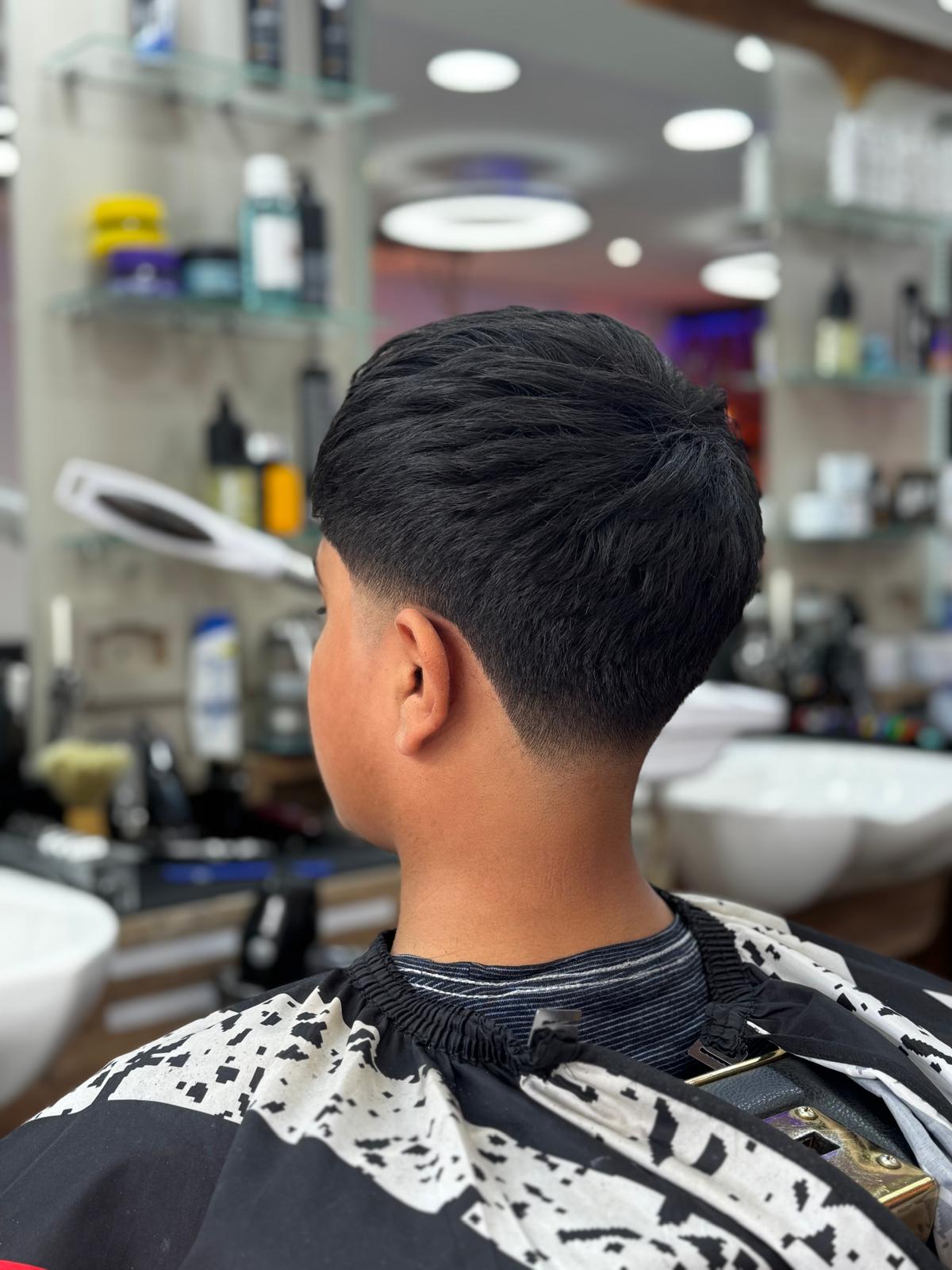 Low taper fade with textured top