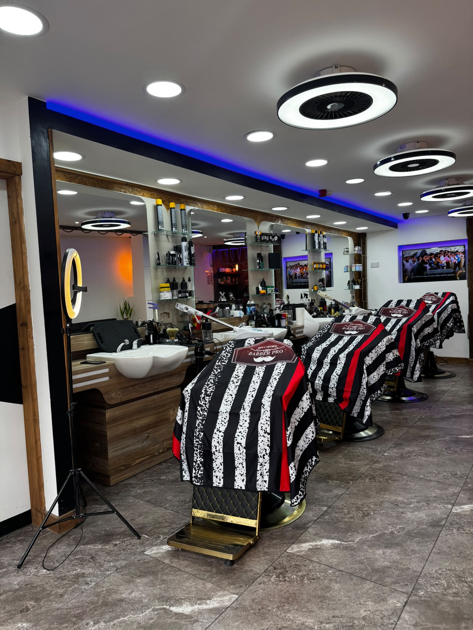 Adam's Barber chairs and mirrors